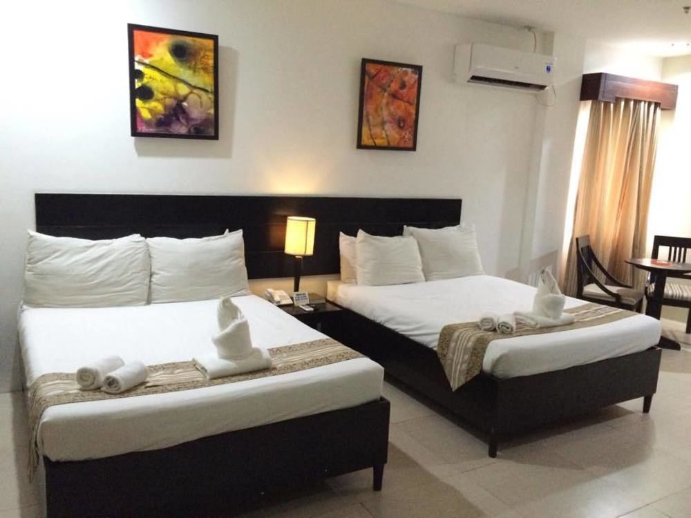 Holiday Suites Puerto Princesa Екстер'єр фото